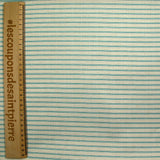 Coton imprimé à rayures hachurées turquoise fond beige clair