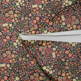 Tissu imperméable déperlant imprimé jardin floral orange