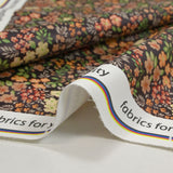Tissu imperméable déperlant imprimé jardin floral orange