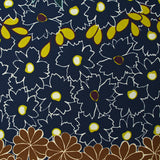 Crêpe polyester imprimé frises de fleurs fond marine