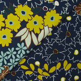 Crêpe polyester imprimé frises de fleurs fond marine