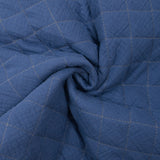 Double gaze matelassée double face bleu et grège au mètre