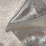 Laminado de poliamida y acetato de plata.