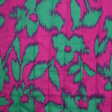 Double gaze matelassée double face Maui fond turquoise et magenta au mètre