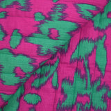 Double gaze matelassée double face Maui fond turquoise et magenta au mètre