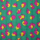 Double gaze matelassée double face Maui fond turquoise et magenta au mètre