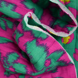 Double gaze matelassée double face Maui fond turquoise et magenta au mètre
