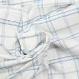 Coton tissé teint carreaux trait bleu fond blanc