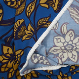 Viscose imprimée feuillage marine et curry fond bleu