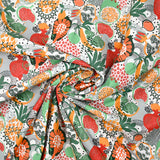 Popeline de coton imprimée fruit exotique orange et vert