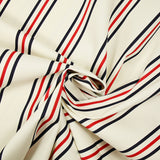 Gabardine 100% coton rayure bleu marine et rouge fond blanc cassé