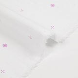 Viscose imprimée signes violet fond blanc