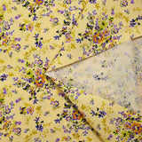 Popeline de coton imprimée fleur baroque mauve fond jaune pastel