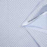 Coton tissé teint imprimé soleil noir fond bleu