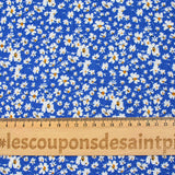 Viscose imprimée fleurs blanches et jaunes fond bleu