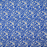 Viscose imprimée fleurs blanches et jaunes fond bleu