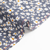 Viscosa estampada flores blancas y amarillas fondo gris antracita