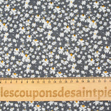 Viscosa estampada flores blancas y amarillas fondo gris antracita