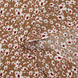 Viscose imprimée fleurs blanches et bordeaux fond noisette
