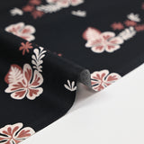 Popeline de coton imprimée fleur aloha marron fond noir
