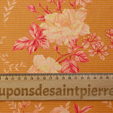 Popeline de coton imprimée rosier rose fond rayé orange