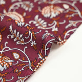 Coton indien imprimé Amayra blanc et rouille fond grenat