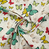 Popeline de coton imprimée papillon pois beige fond blanc