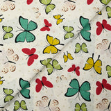 Popeline de coton imprimée papillon pois beige fond blanc