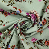Popeline de coton imprimée fleur arabesque violet fond vert de gris