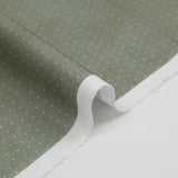 Coton imprimé pois 1mm fond tie and dye vert sauge