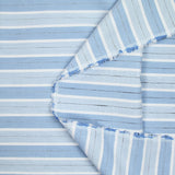 Popeline polycoton jacquard rayure blanche, bleue et noire doupionnée