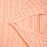 Jersey pointelle 100% coton saumon