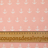 Coton imprimé ancre marine blanche fond rose clair