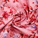 Popeline de coton imprimée romantisme corail fond rose