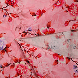 Popeline de coton imprimée romantisme corail fond rose