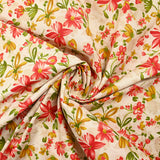Popeline de coton imprimée fleurs ocre et rouge fond beige