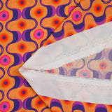 Viscose imprimée agitation violet et rose fond orange