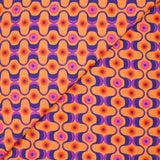 Viscose imprimée agitation violet et rose fond orange