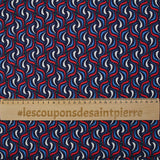 Coton imprimé vague rouge fond marine