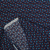 Coton imprimé planète rayé rouge fond marine