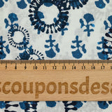 Indian cotton printed with navy blue and petrol prints on a white background