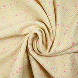 Tweed de laine mélangée confettis rose et bleu fond jaune