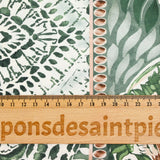 Twill polyester imprimé frise florale verte et marron fond blanc cassé
