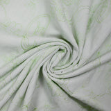 Polycoton froissé et brodé fleurs vert anis