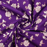 Popeline de coton imprimée ornemental marron fond violet