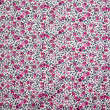 Coton imprimé Anna fleurs rose et fuchsia fond blanc au mètre