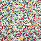Coton imprimé Aurora fleurs rouge et jaune fond blanc au mètre