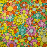 Coton imprimé flower power rose fond vert
