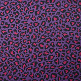 Coton imprimé léopard fuchsia fond violet