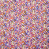 Coton imprimé Matilde fleurs corail et lavande au mètre